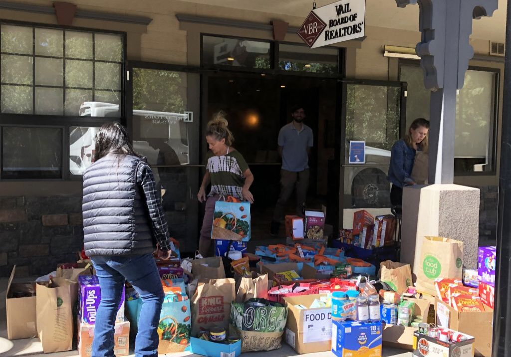 Community Market and VBR staff loading food.